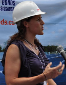 Judy presenting at the ribbon-cutting of SolarShare's "Waterview" project, in 2011